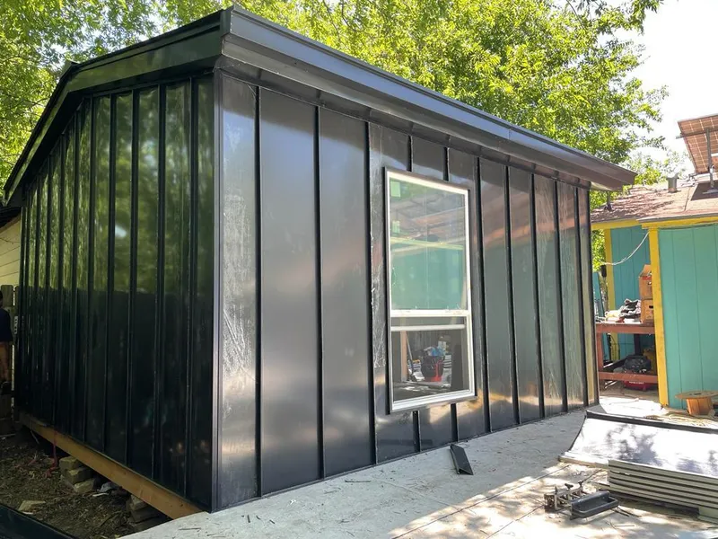 Black standing seam metal wall panels for Roof Inspection in Mendon