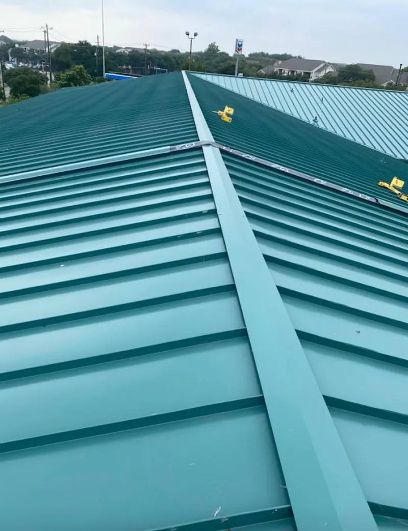 Green commercial metal roof ridge and valley for Metal Roof Repair in Mendon