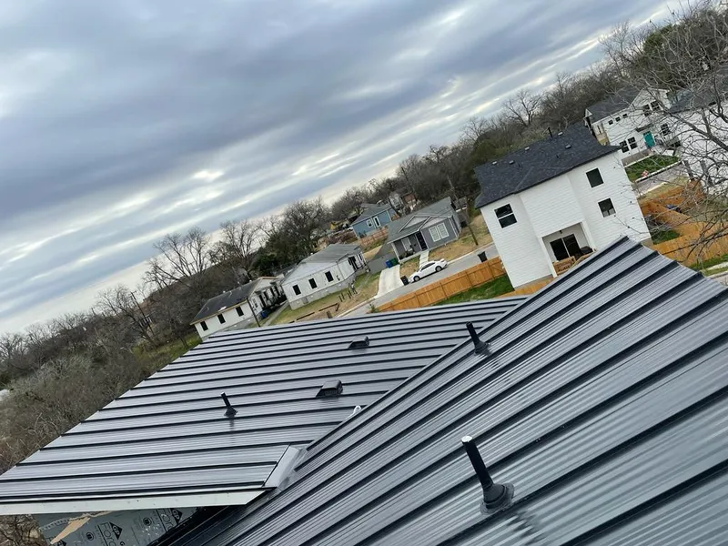 Standing seam metal roof panels with vents for Skylight Repair in Mendon